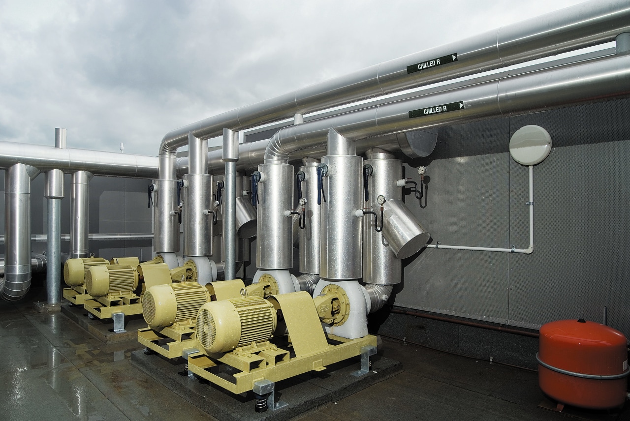 A view of a air conditioning system by machine, black, white, gray