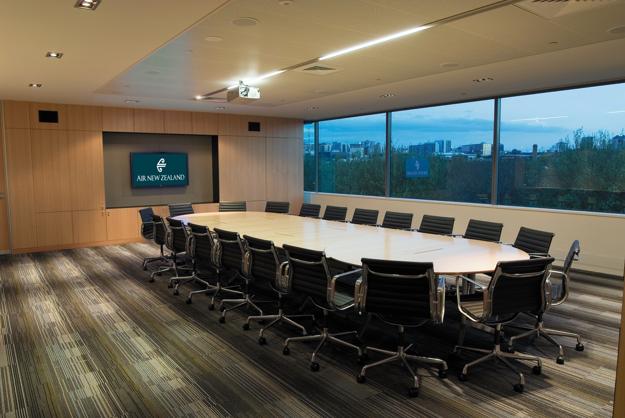 A view of the AirNZ building. auditorium, conference hall, interior design, office, real estate, table, brown, black