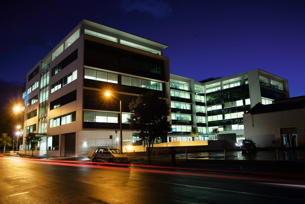 An exterior view of the AirNZ building. apartment, architecture, building, city, commercial building, condominium, corporate headquarters, evening, facade, headquarters, home, hotel, house, lighting, metropolis, metropolitan area, mixed use, neighbourhood, night, property, real estate, residential area, sky, window, black, blue