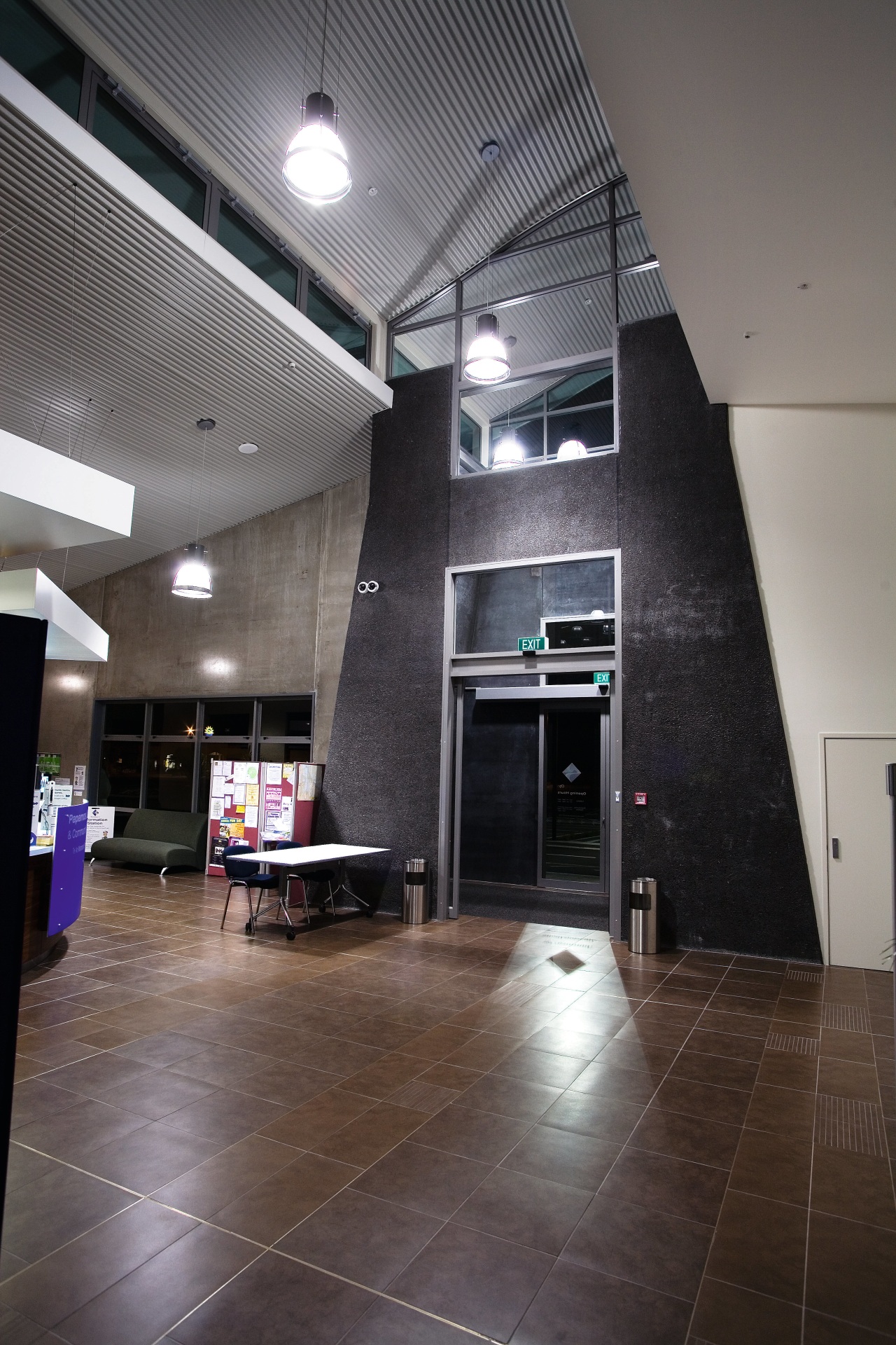 A view of some lighting in the Papamoa architecture, ceiling, daylighting, floor, flooring, glass, house, interior design, lobby, wood, gray, black