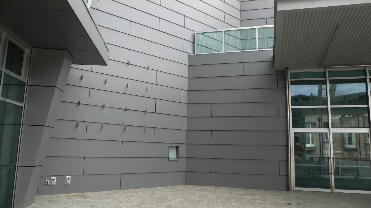 A view of the Vector Arena. architecture, building, daylighting, facade, glass, siding, structure, wall, window, gray, black