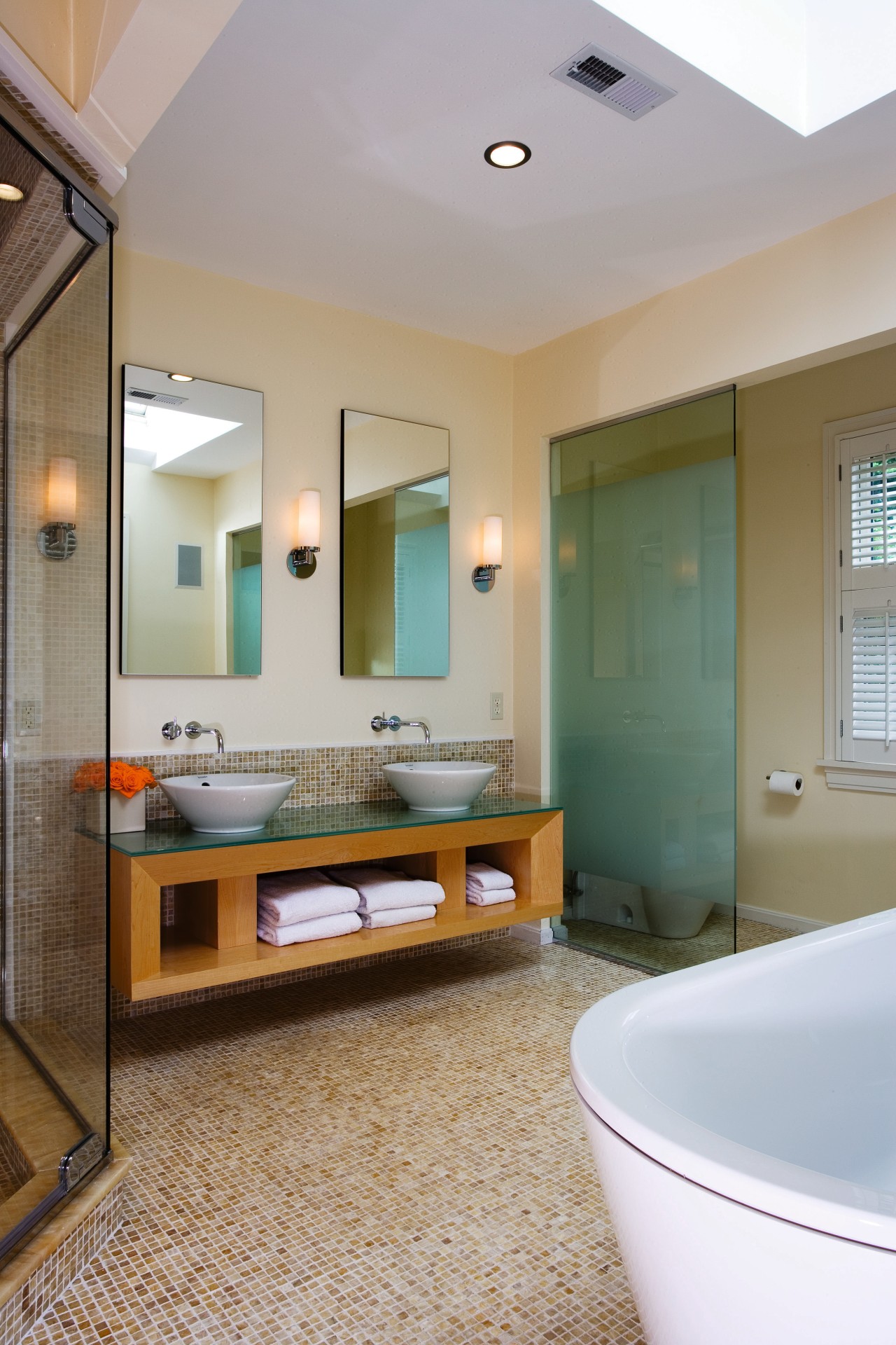 view of the bathroom featuring, freestanding bathtub, glass bathroom, ceiling, floor, home, interior design, real estate, room, gray