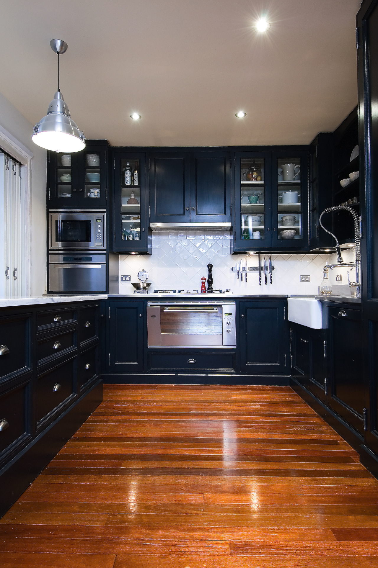 A view of a carpentry-built kitchen by Scullery cabinetry, countertop, floor, flooring, hardwood, home, interior design, kitchen, room, wood, wood flooring, black