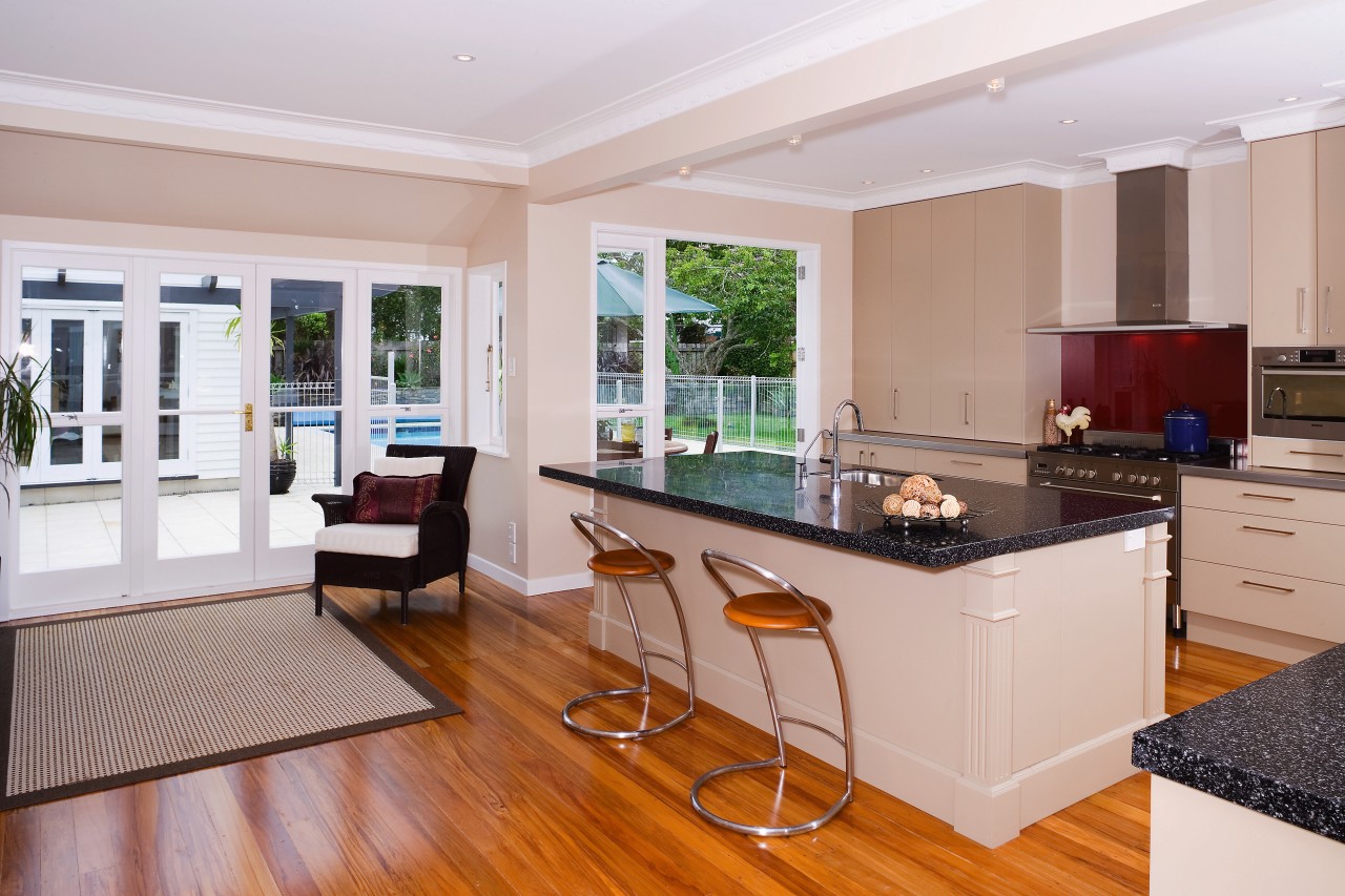 A view of the kitchen area, wooden flooring, countertop, floor, flooring, interior design, kitchen, real estate, room, window, gray