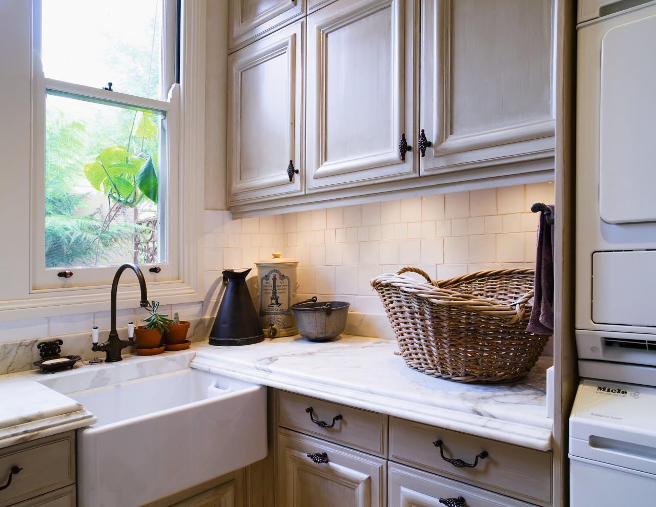 Interior view of laundry featuring marble benchtops from cabinetry, countertop, cuisine classique, home, interior design, kitchen, room, window, gray