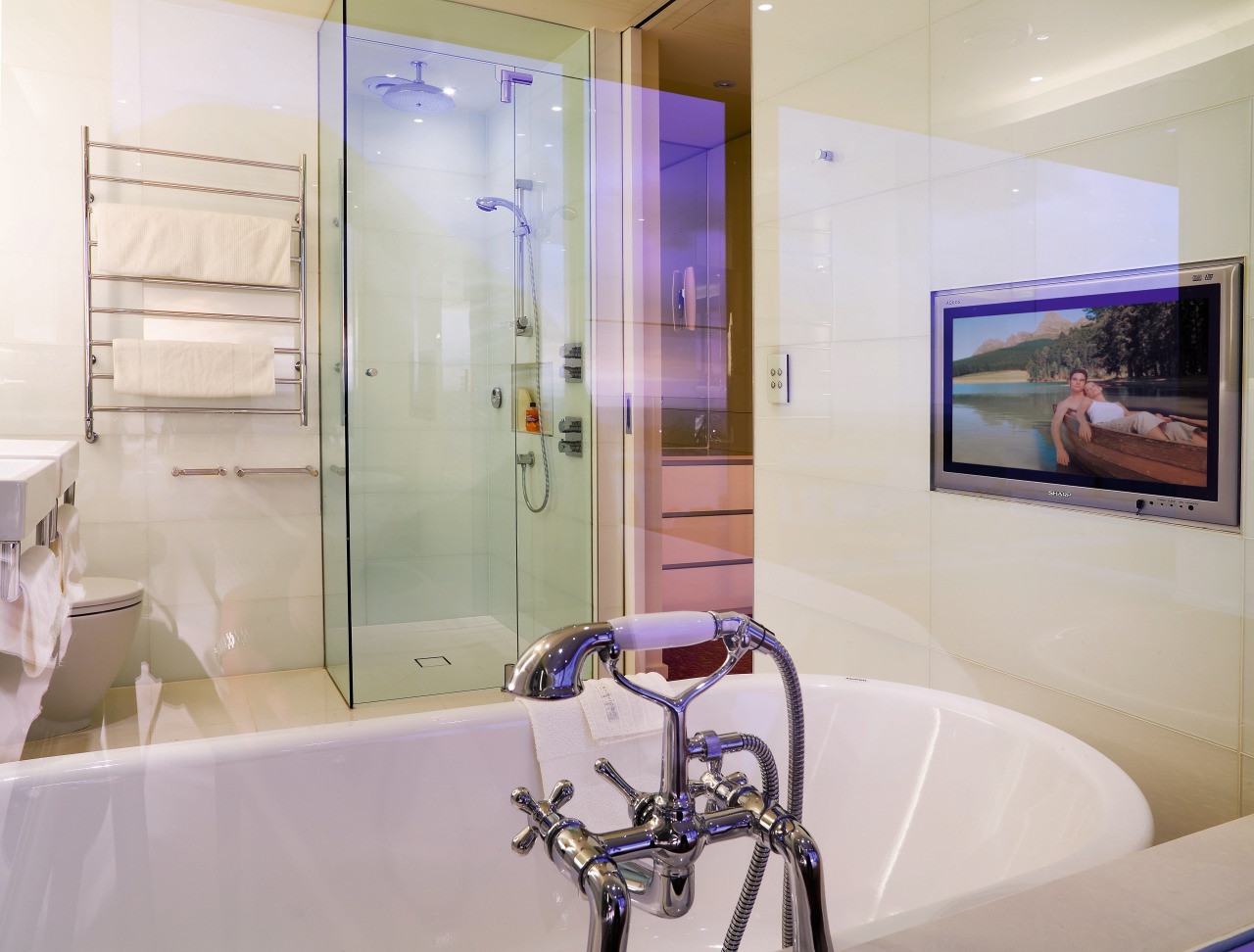 The deep tub, which fetures a built-in LCD bathroom, interior design, property, room, gray