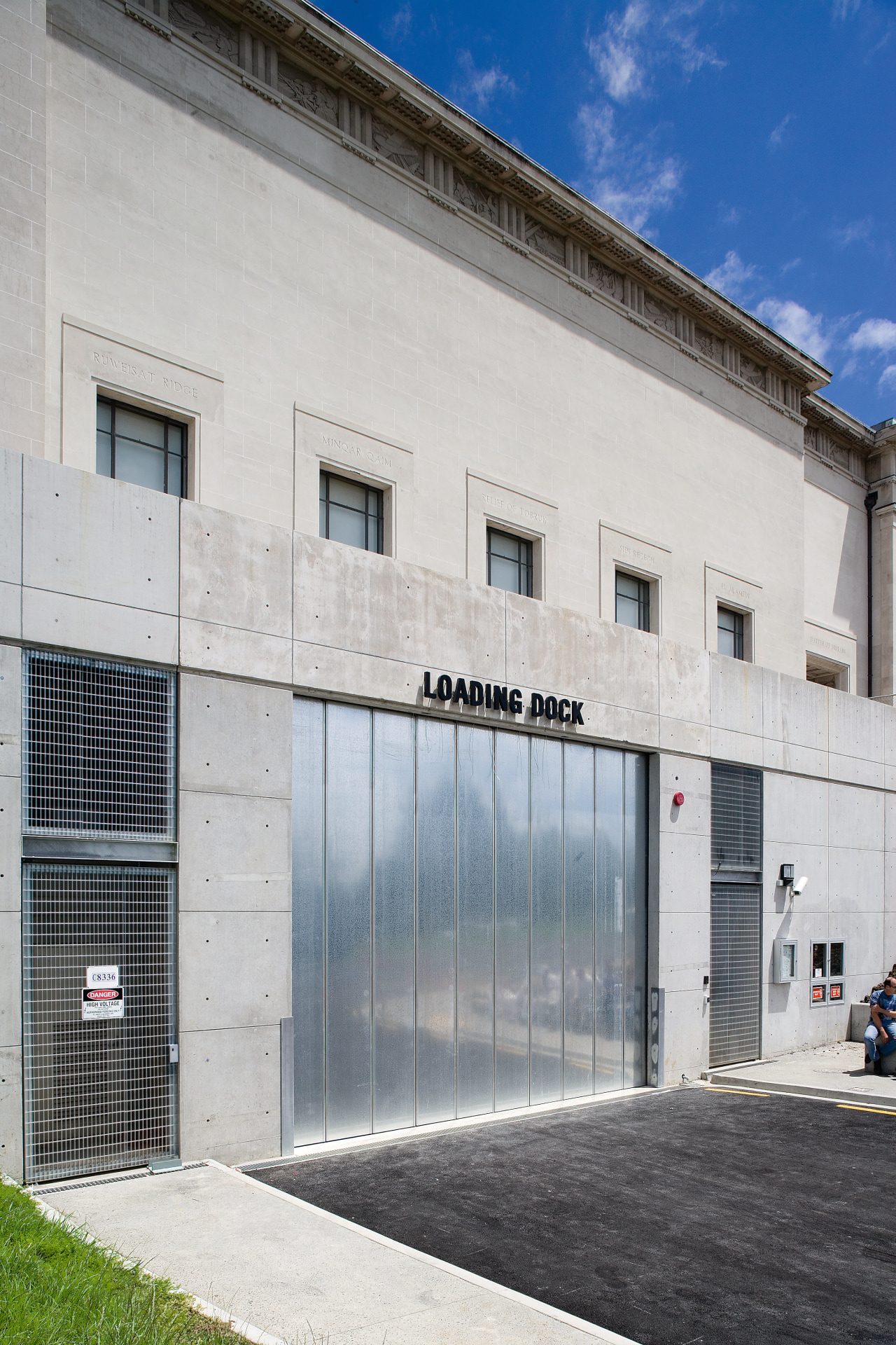 View of the Loading Dock constructed at the architecture, building, commercial building, door, facade, house, property, real estate, residential area, window, gray, white