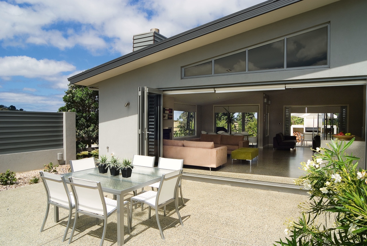 A view of a home by GJ Gadiner estate, home, house, outdoor structure, patio, property, real estate, window, gray