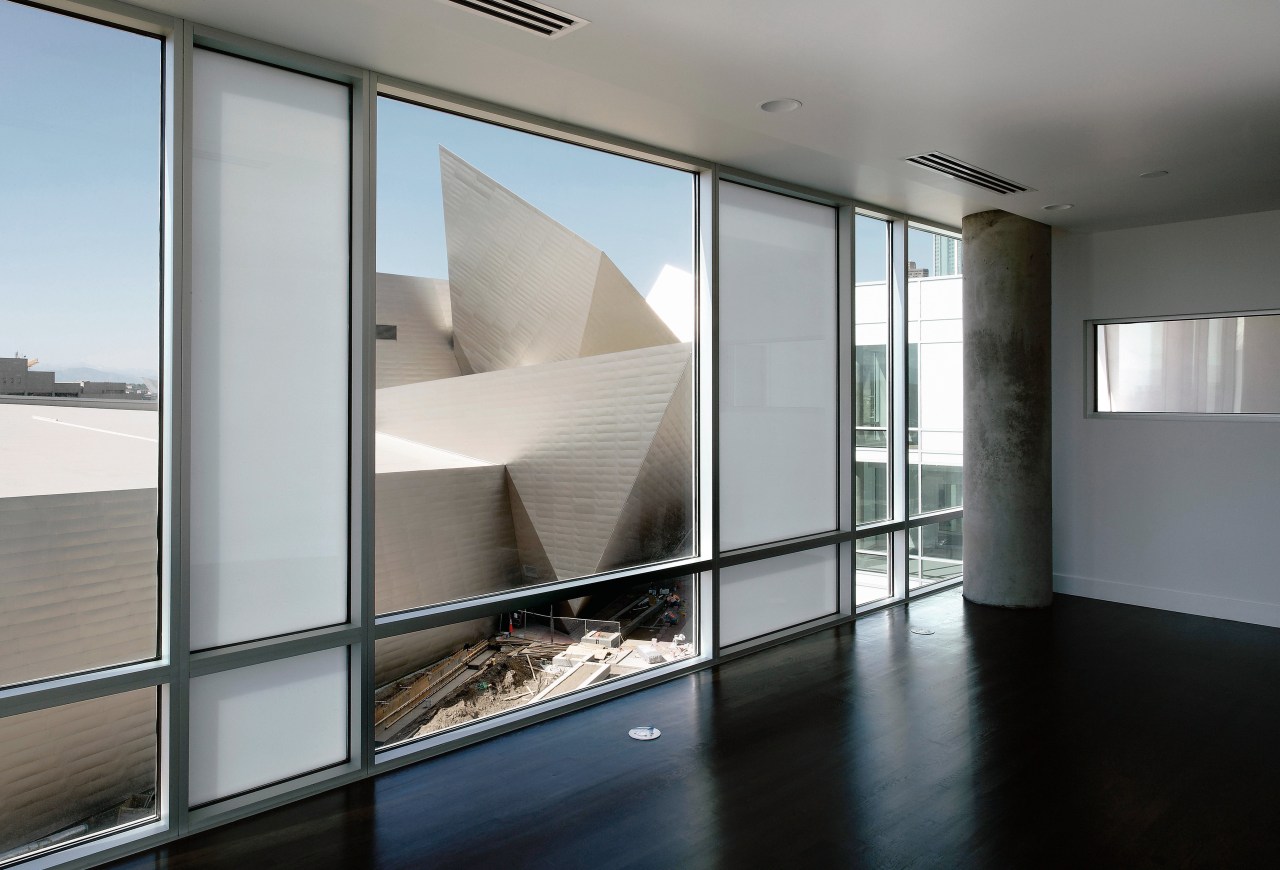 A view of Devers new Cultural Centre witch architecture, condominium, daylighting, door, glass, house, interior design, property, real estate, window, gray