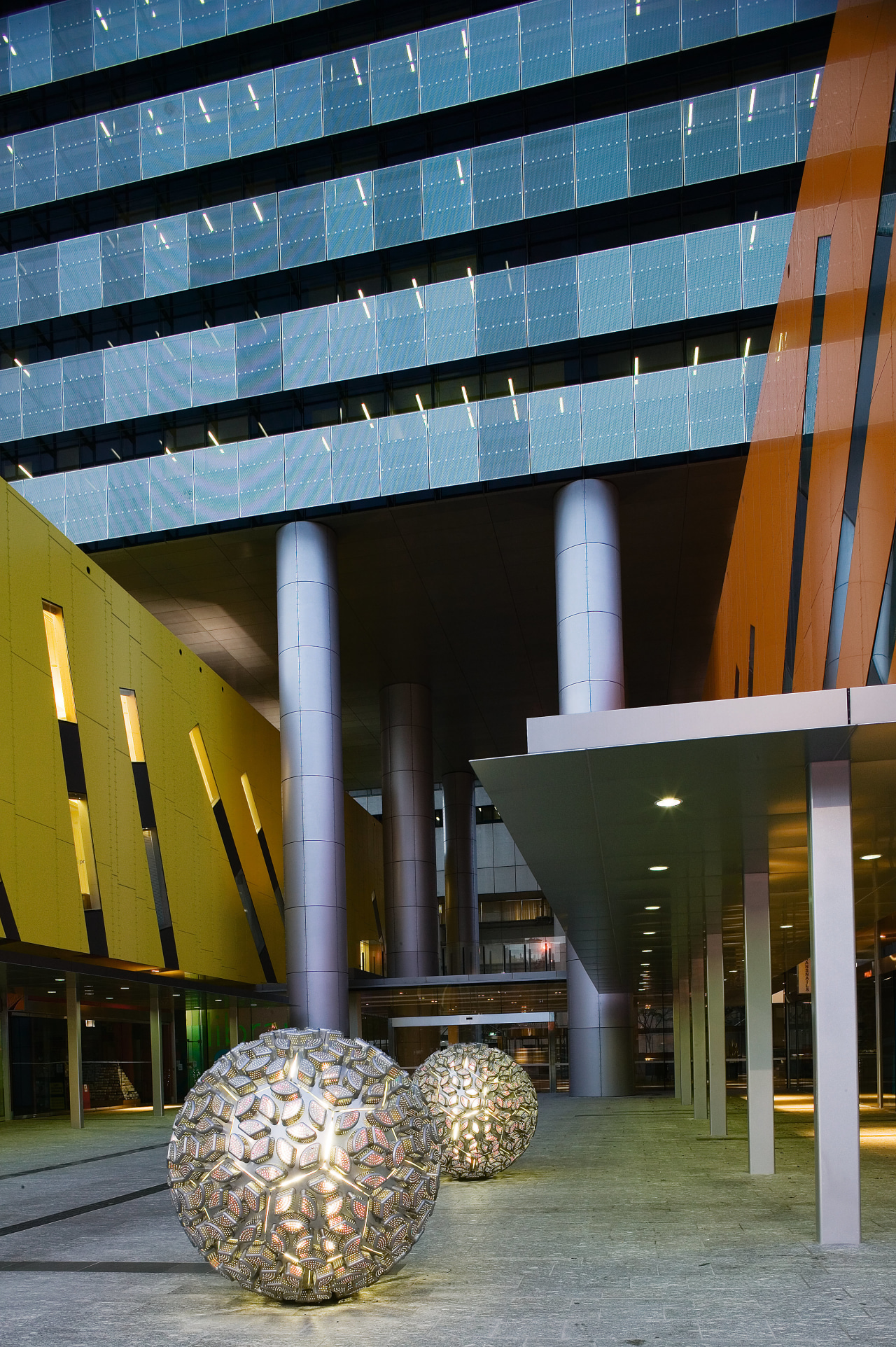 View of Brisbane square featuring bright colours, sculptured architecture, building, condominium, daylighting, daytime, facade, tourist attraction, black