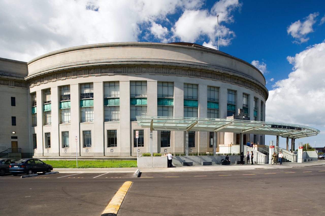 Exterior view of the refurbuished and upgraded museum architecture, building, city, classical architecture, commercial building, corporate headquarters, daytime, facade, landmark, metropolitan area, mixed use, sky, structure, white, gray