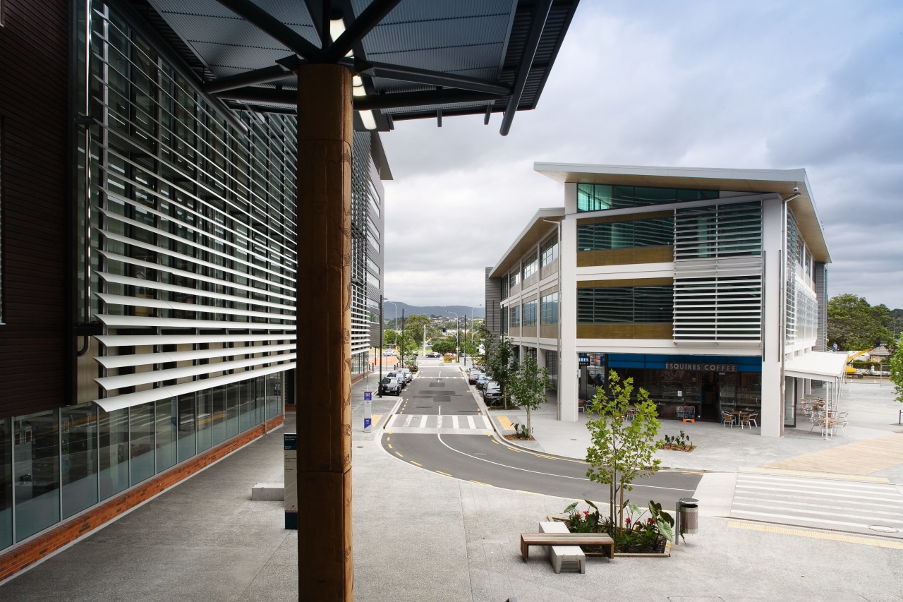 Waitakere Central is a commercial development comprising cutting-edge architecture, building, condominium, metropolitan area, structure, white, black