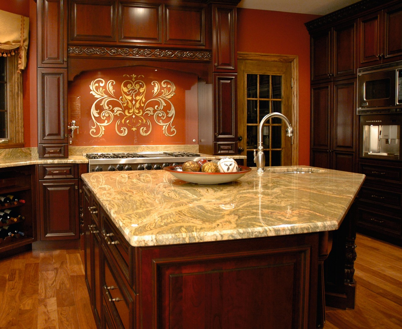 A view of this modern kitchen designed by cabinetry, countertop, cuisine classique, floor, flooring, hardwood, interior design, kitchen, room, under cabinet lighting, wood, wood flooring, wood stain, brown, red