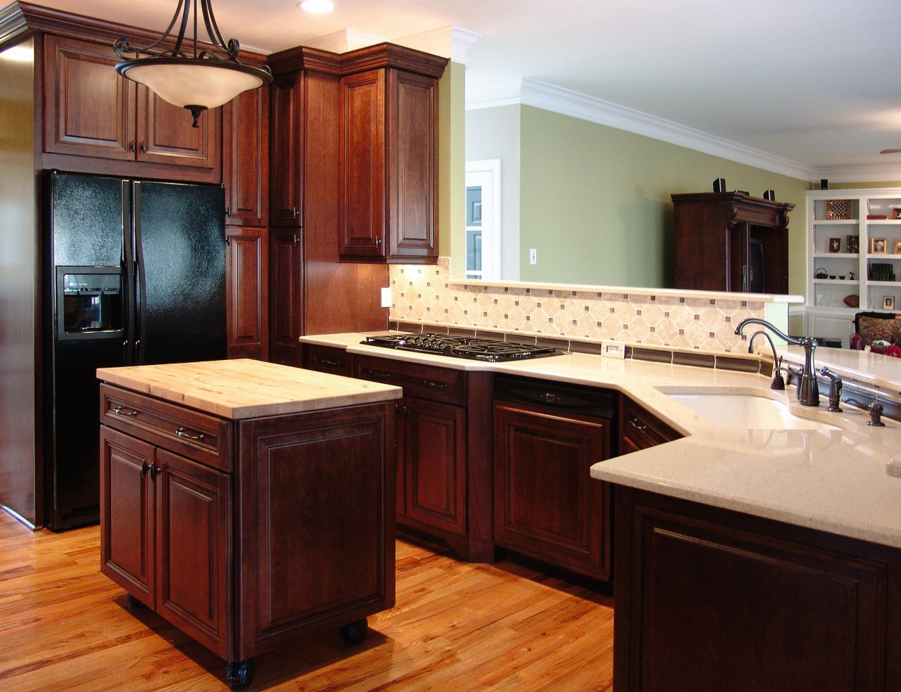 A view of this kitchen designed by Box cabinetry, countertop, cuisine classique, flooring, hardwood, interior design, kitchen, room, wood, wood stain, red