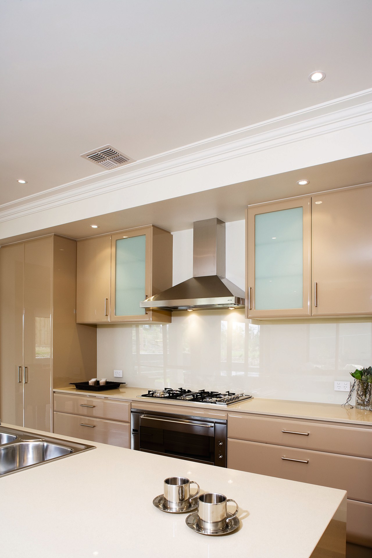 A view of some kitchen appliances from Omega architecture, ceiling, countertop, daylighting, home, interior design, kitchen, room, white