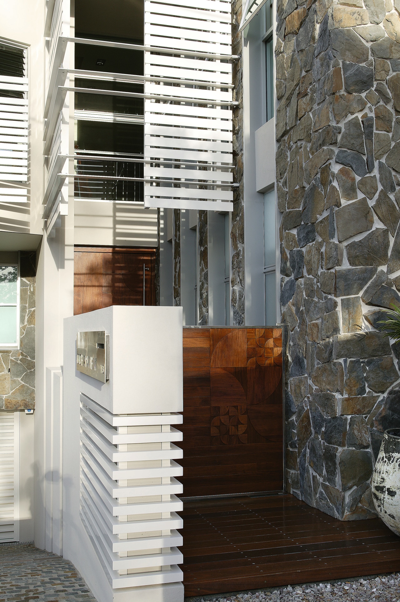 Exterior view of the solid masonry beachfront house architecture, house, interior design, window, black, white, gray