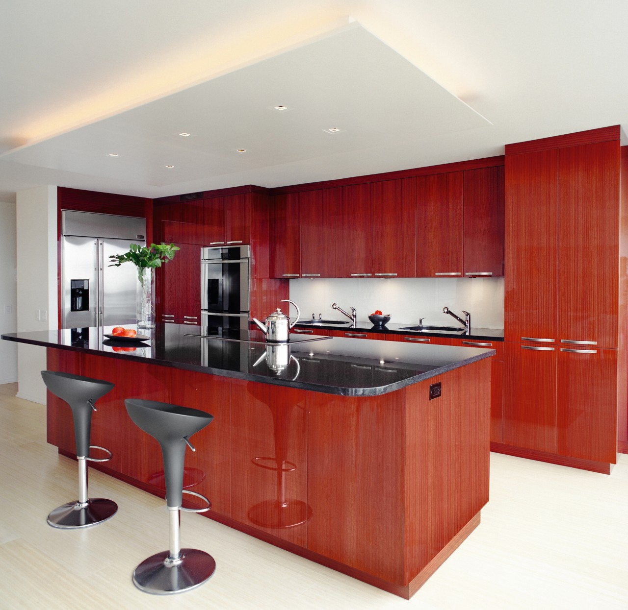 A view of this kitchen features cabinets by cabinetry, countertop, cuisine classique, interior design, kitchen, room, white, red