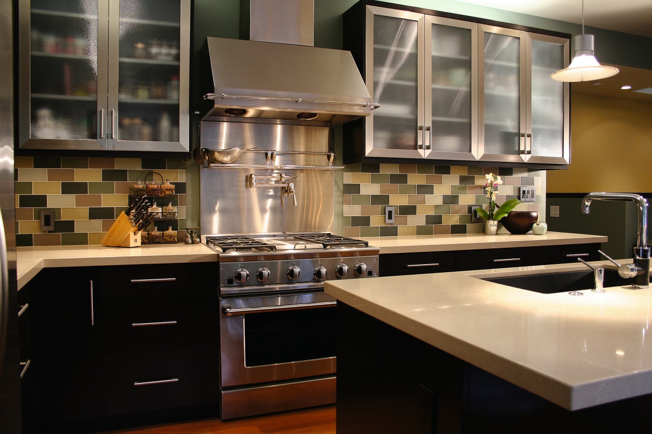 View of this kitchen featuring stained timber flooring, cabinetry, countertop, cuisine classique, interior design, kitchen, room, black