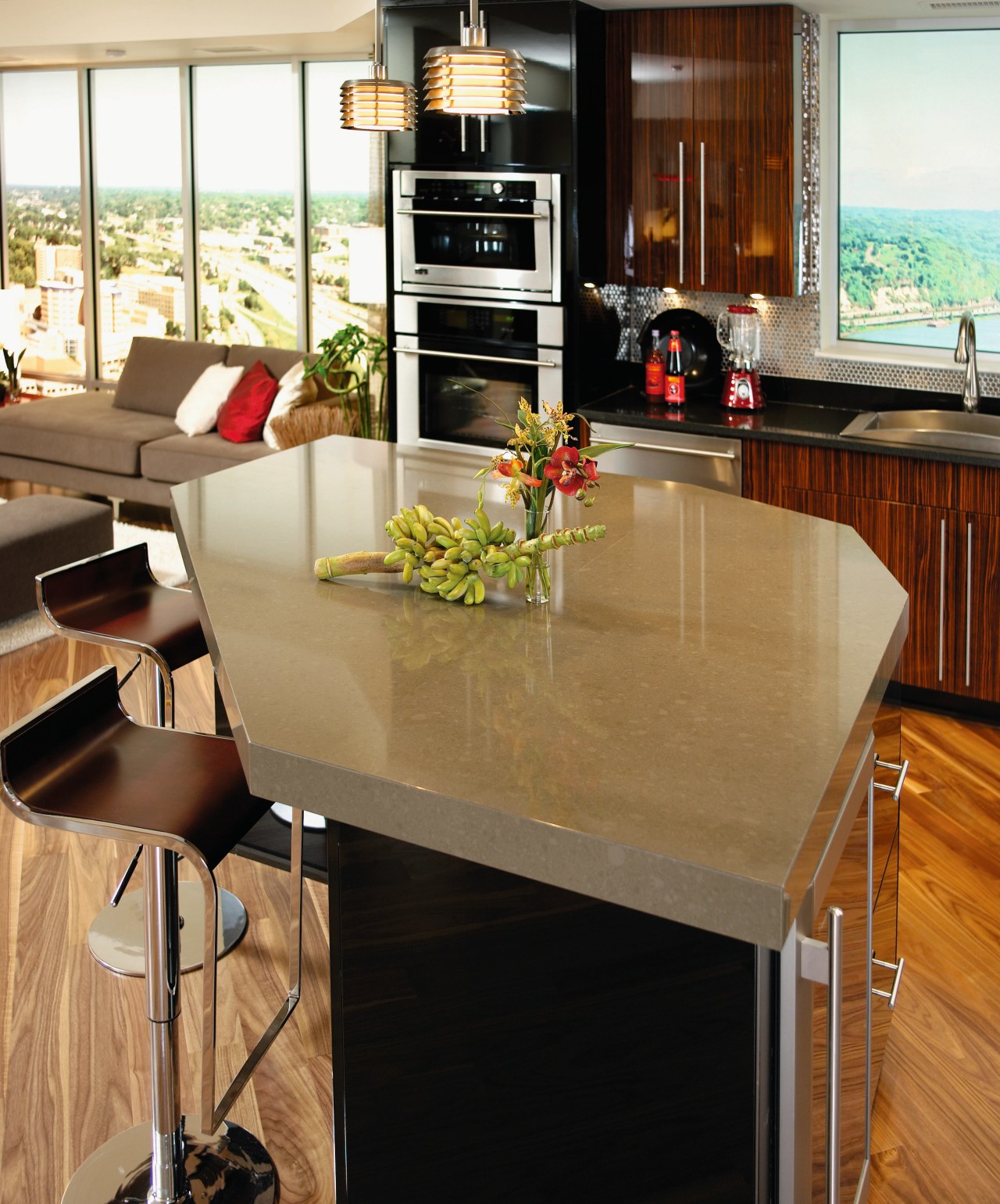 A view of this kitchen featuring quatrsz benchtops, countertop, dining room, floor, flooring, furniture, hardwood, interior design, kitchen, table, wood flooring, brown