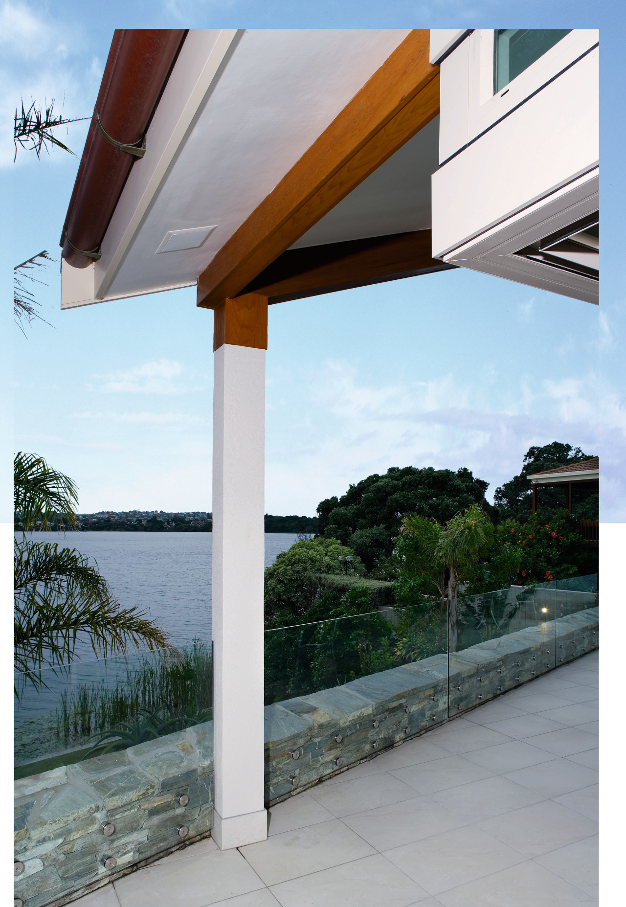 A view of some audio visula technology from house, property, roof, sky, structure, window, gray, white