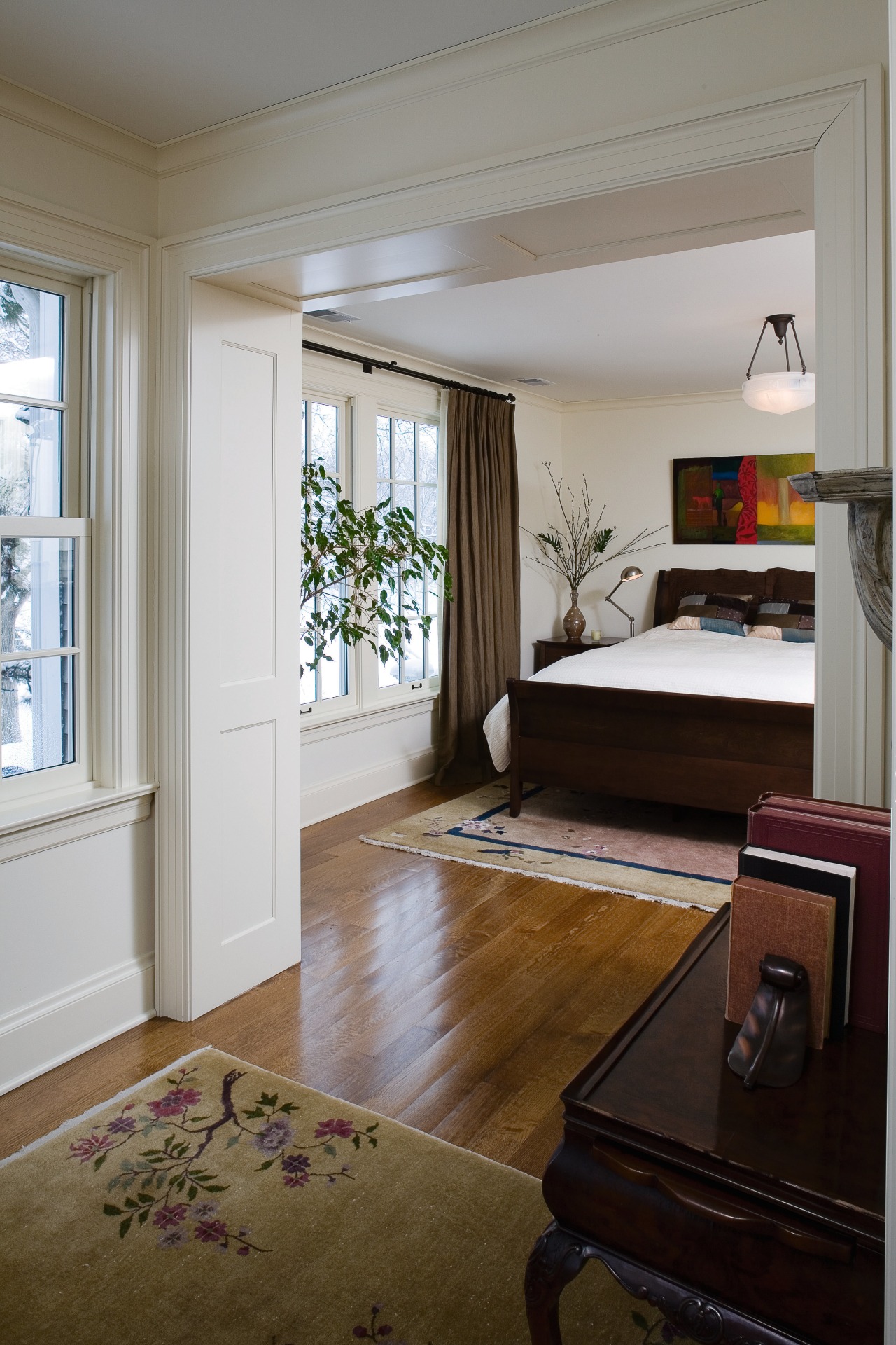 A view of the master bedroom. bedroom, ceiling, door, floor, flooring, hardwood, home, house, interior design, living room, real estate, room, wall, window, wood, wood flooring, gray