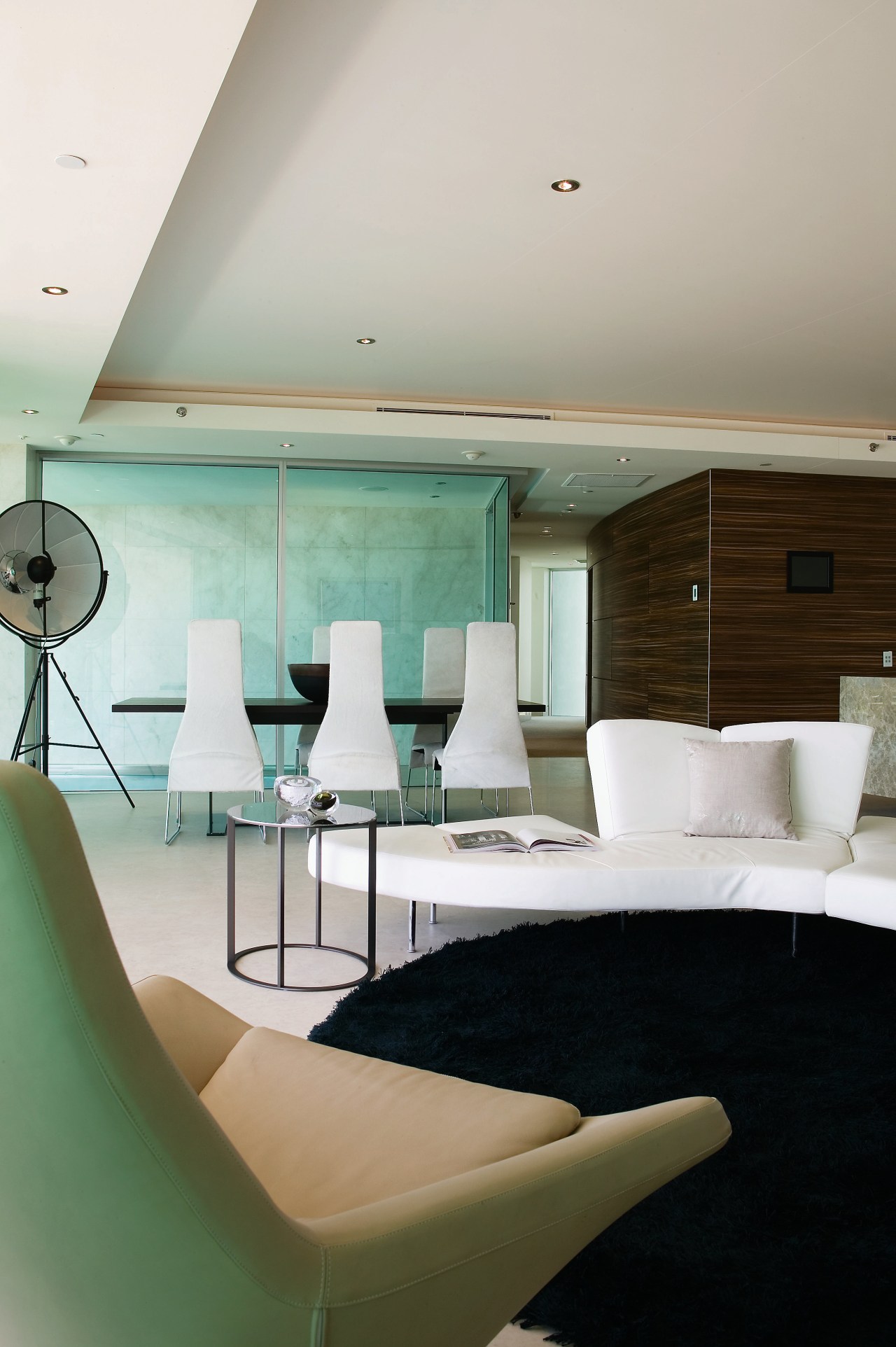 A view of the interior living space in architecture, ceiling, daylighting, floor, furniture, interior design, living room, product design, table, gray
