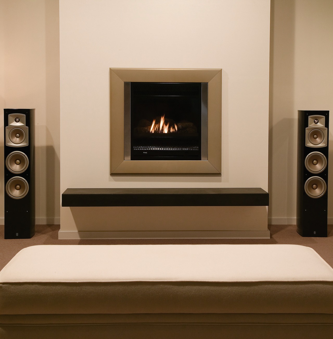 view of gas fireplaces by Rinnai. fireplace, furniture, hearth, home appliance, wood burning stove, brown, orange