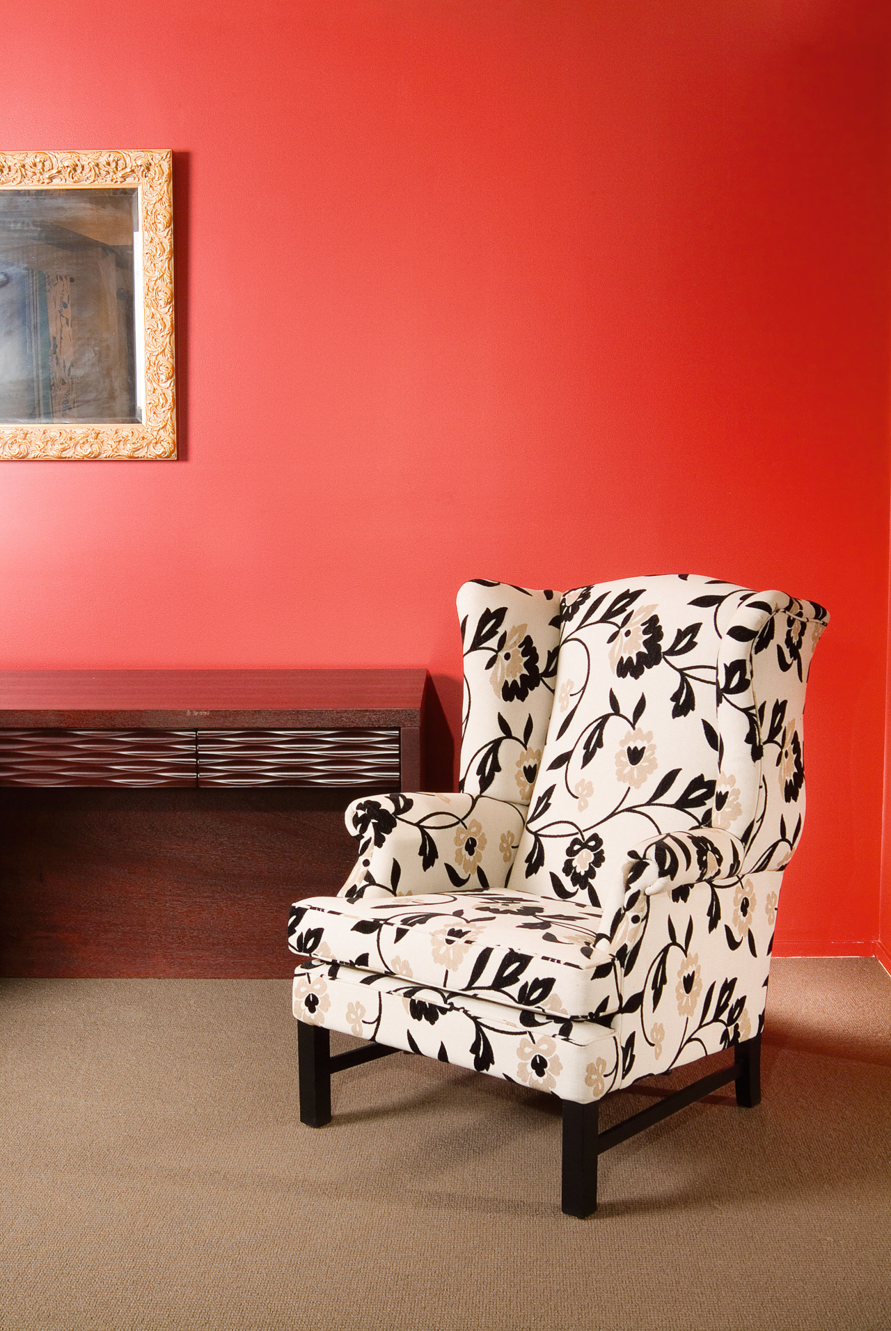 The Edwin Wing Chair combines good support with chair, chaise longue, couch, floor, flooring, furniture, interior design, living room, loveseat, product design, wall, wood, red