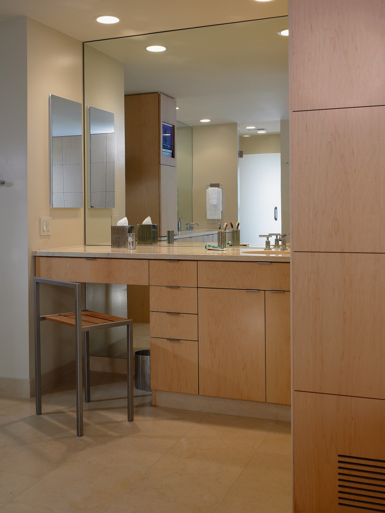 A view of bathroom, wooden cabinetry, lights, cabinetry, countertop, floor, furniture, interior design, kitchen, brown