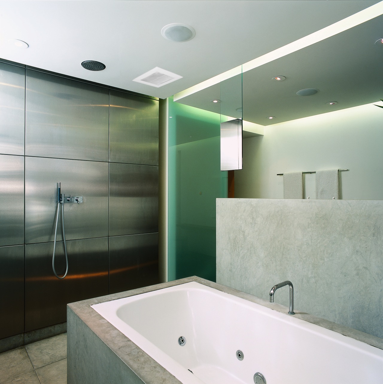 In this bathroom designed by Archis a Panosonic architecture, bathroom, bathtub, ceiling, daylighting, glass, interior design, lighting, real estate, room, wall, gray, white