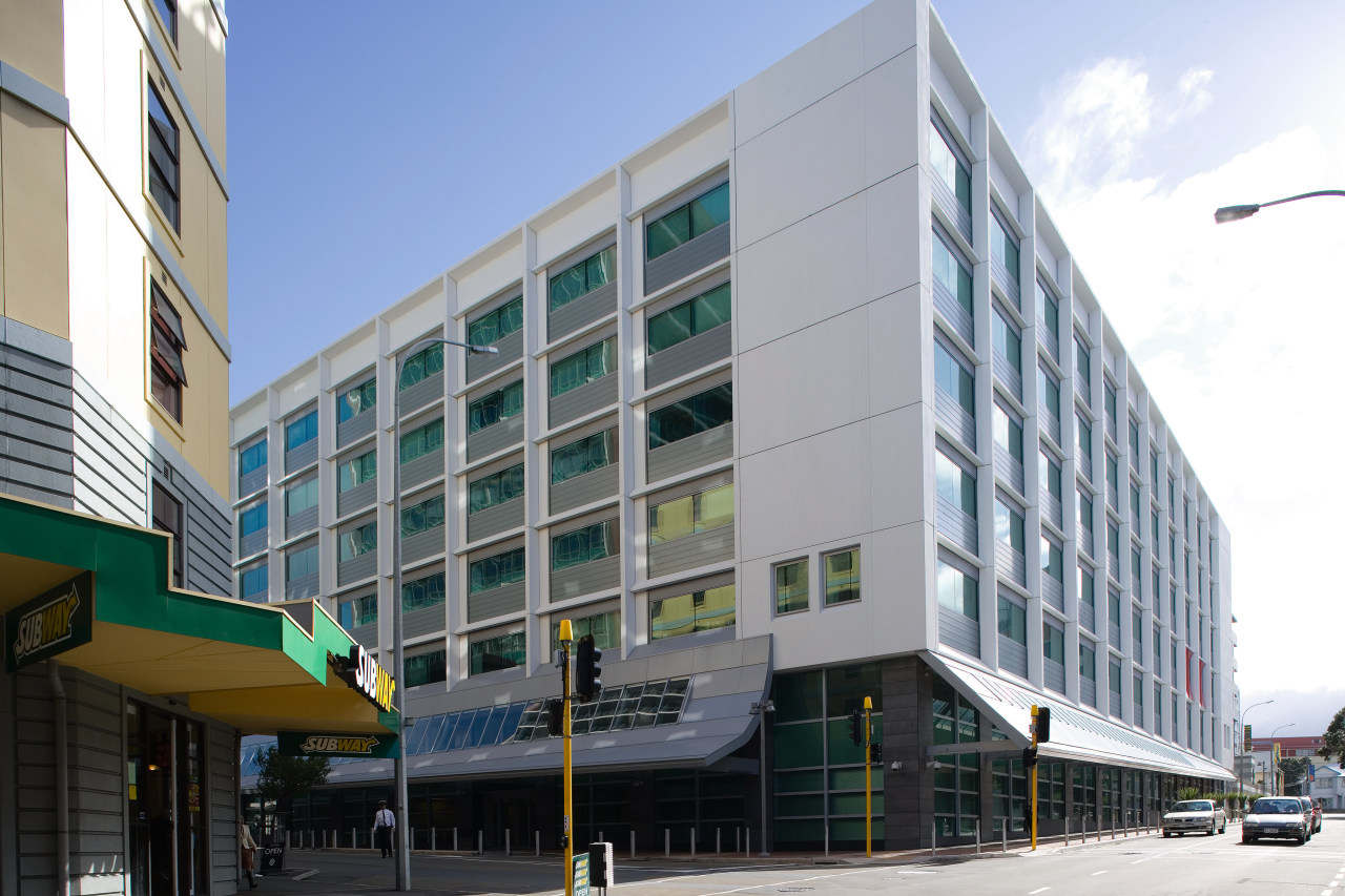 A view of the Headquarters for the New apartment, architecture, building, commercial building, condominium, corporate headquarters, facade, headquarters, metropolitan area, mixed use, neighbourhood, real estate, residential area, gray