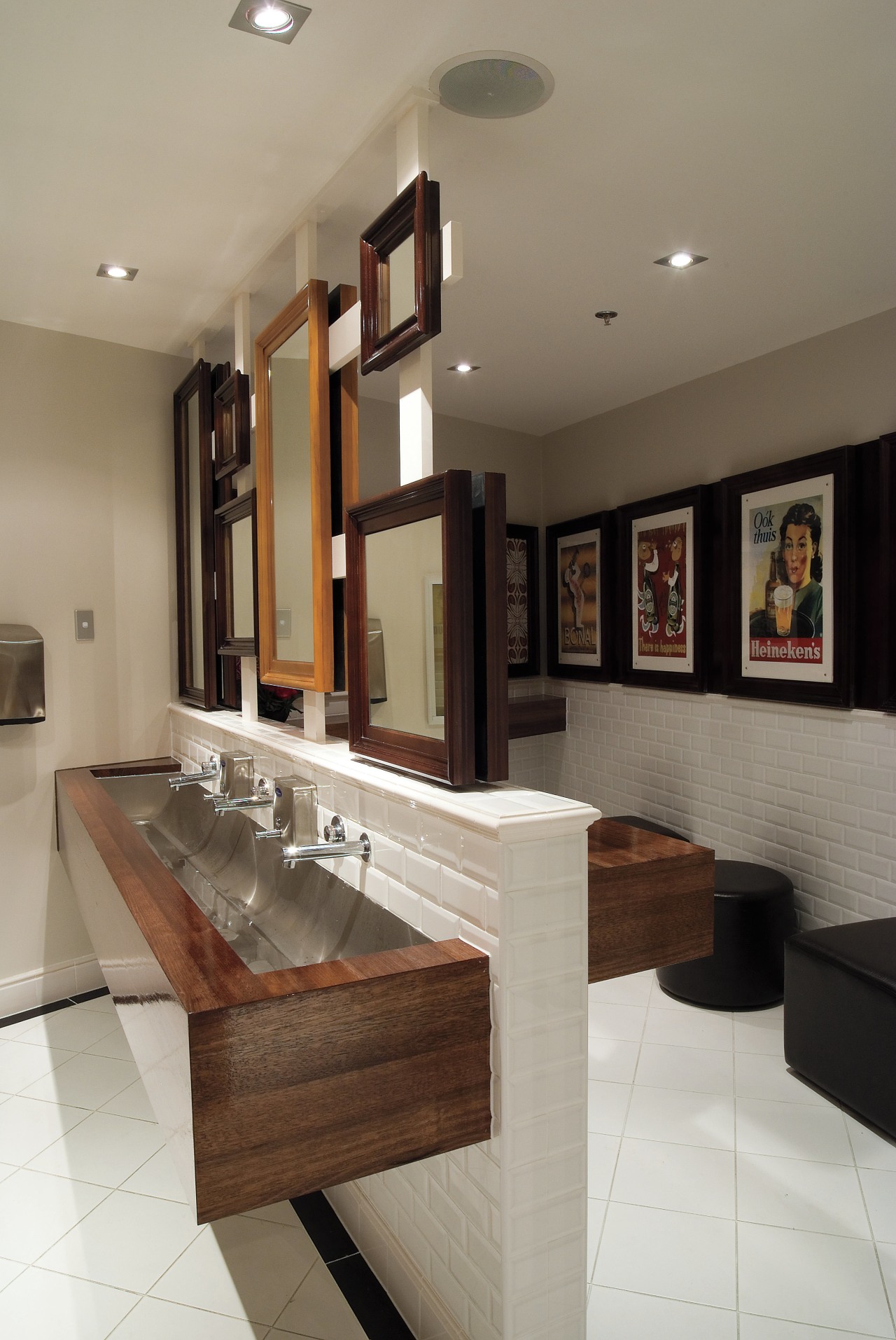 A view of a bar at Sylvia Park ceiling, countertop, floor, flooring, furniture, interior design, living room, real estate, room, table, gray
