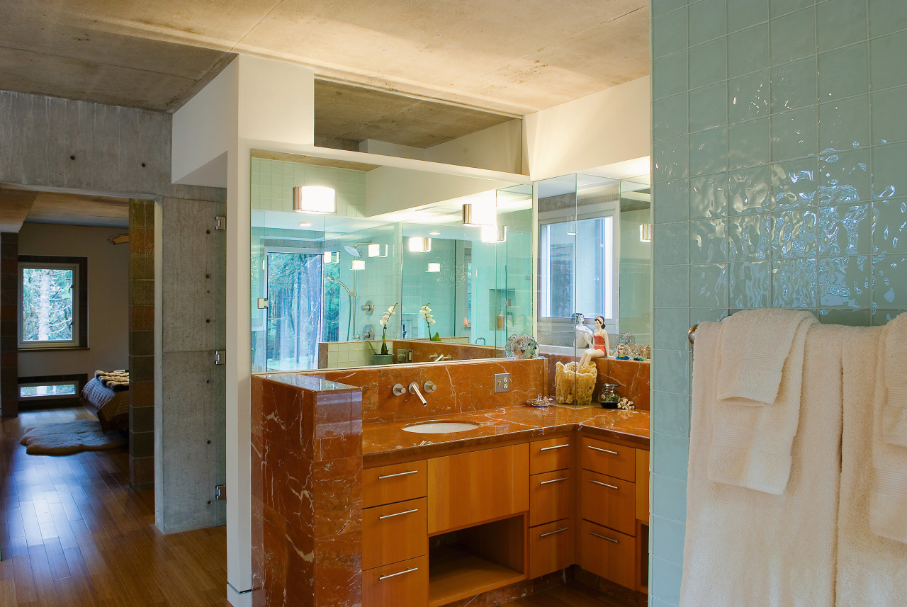 a view of the master bathroom featuring glass cabinetry, ceiling, countertop, floor, home, interior design, kitchen, real estate, room, gray, brown