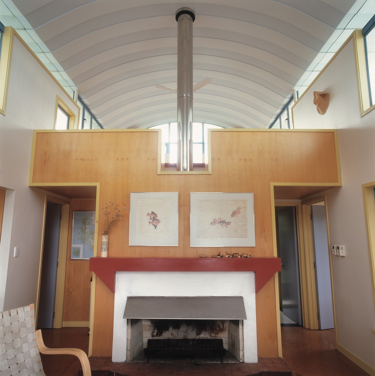 An interior view of the living areas featuring architecture, ceiling, daylighting, floor, furniture, home, real estate, wood, gray