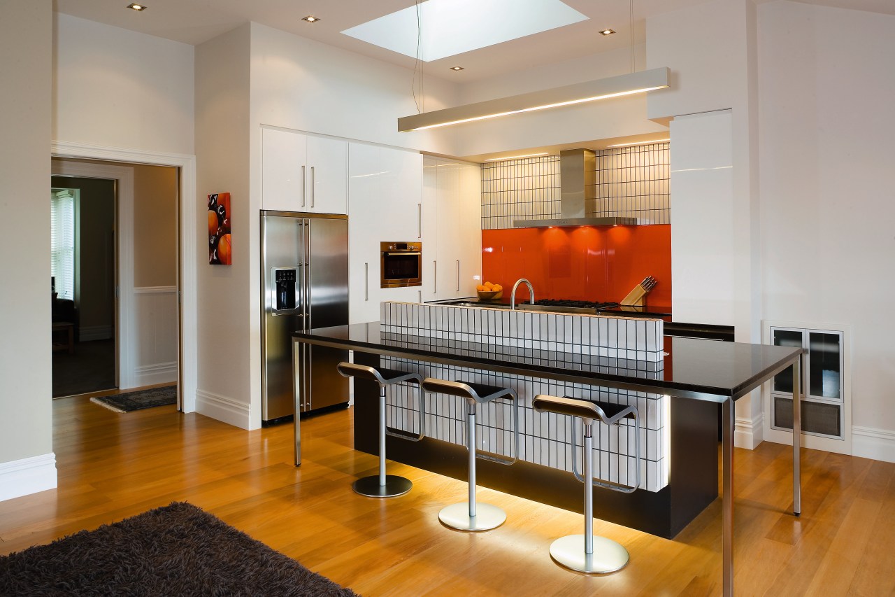 A view of this kitchen featuring kauri flooring, countertop, floor, flooring, interior design, kitchen, real estate, room, gray