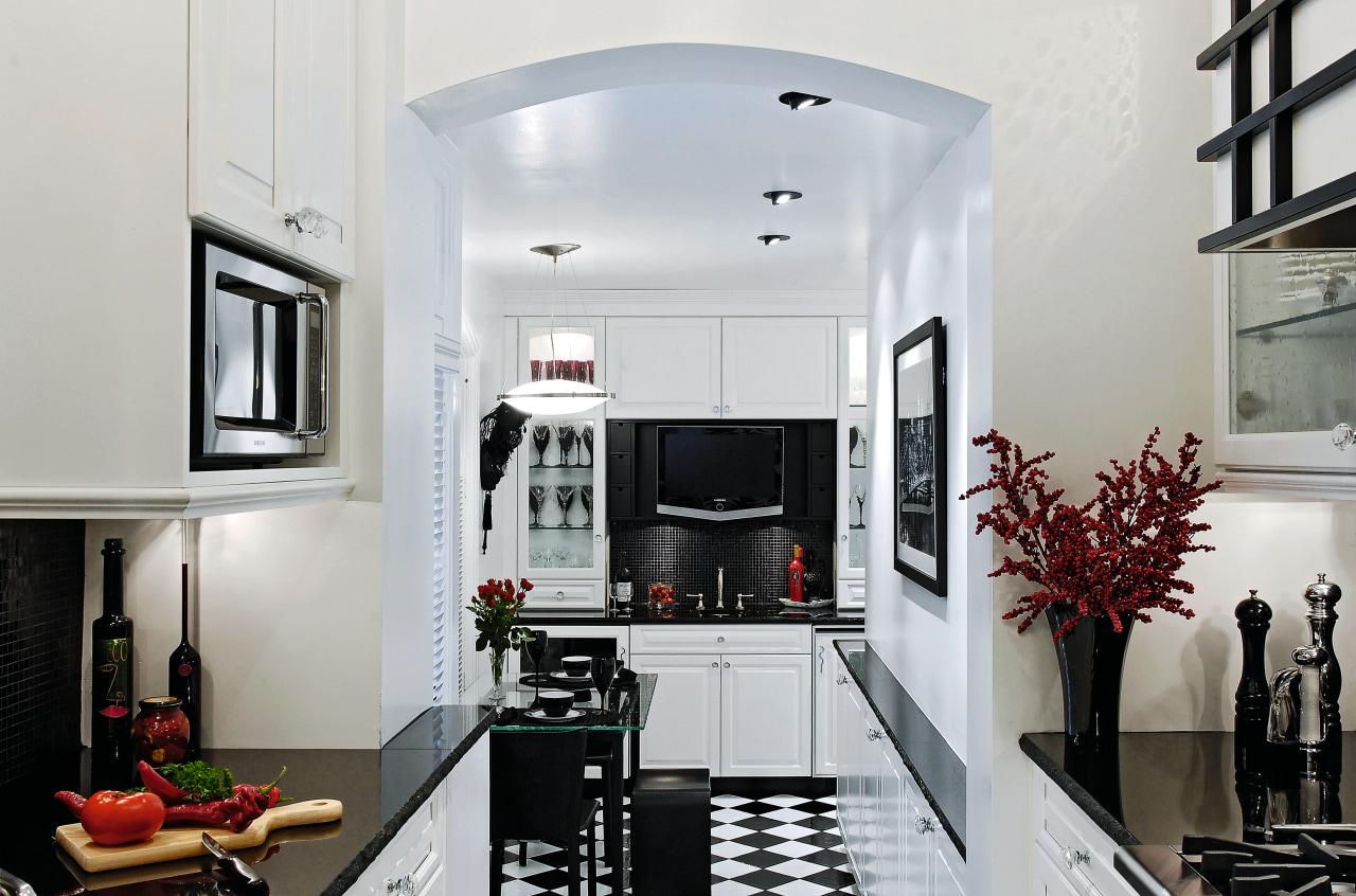 A view of this kitchen featuring black and countertop, home appliance, interior design, kitchen, room, gray