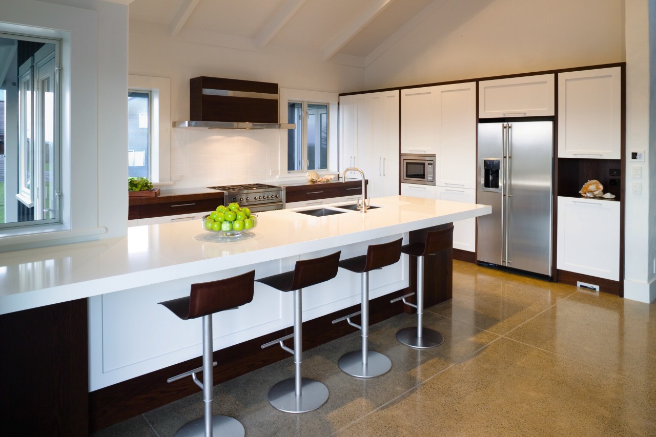 A view of this kitchen featuring laminex caeserstone cabinetry, countertop, cuisine classique, interior design, kitchen, real estate, room, gray