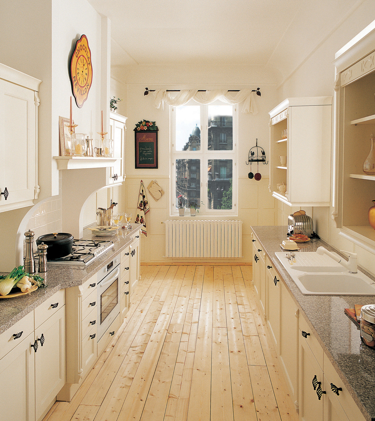 A view of a kitchen by Schmidt Australia. cabinetry, countertop, cuisine classique, floor, flooring, home, interior design, kitchen, real estate, room, window, wood flooring, white, orange