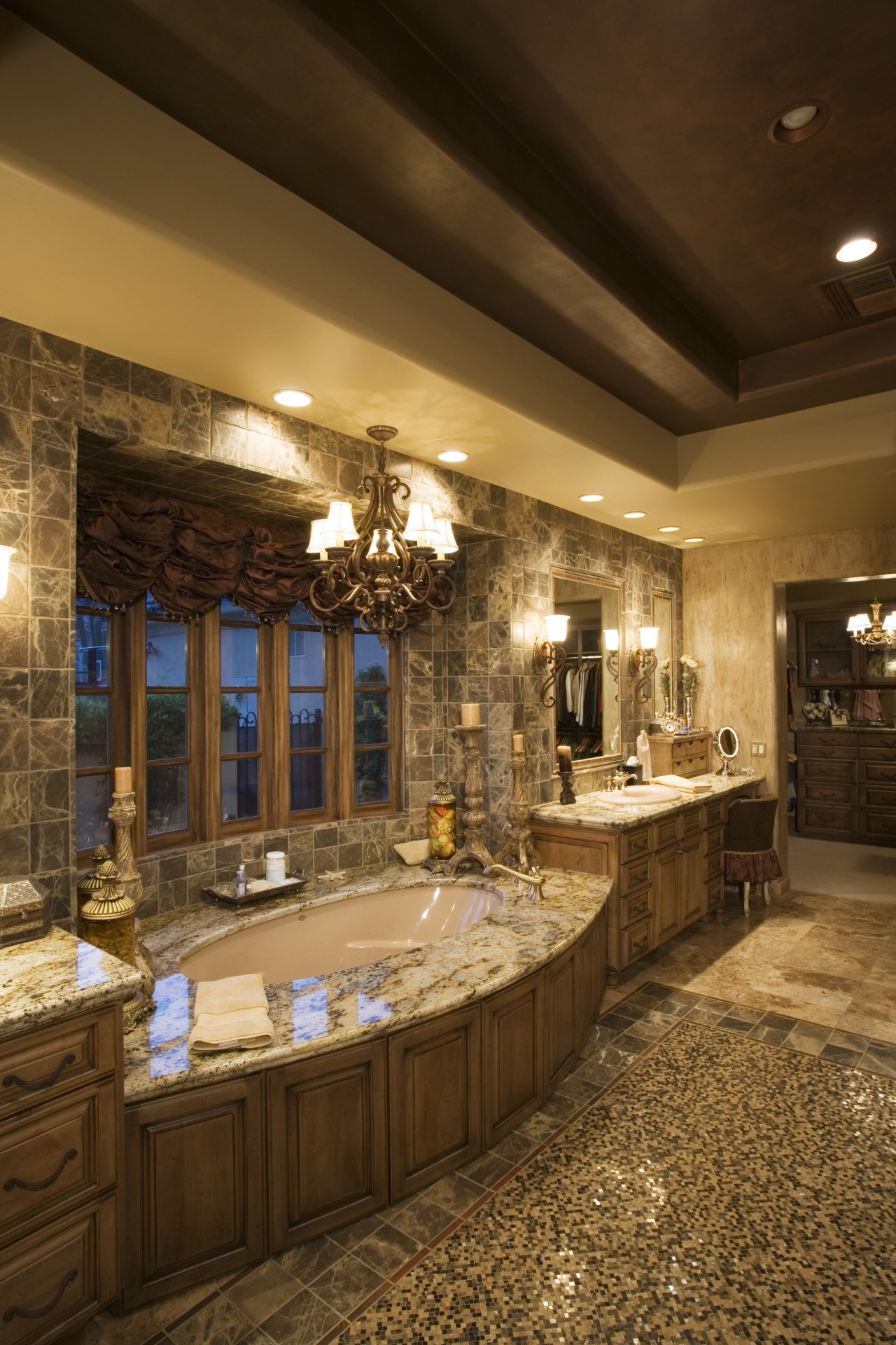 A view of this bathroom featuring gold wave ceiling, countertop, estate, home, interior design, lighting, room, brown