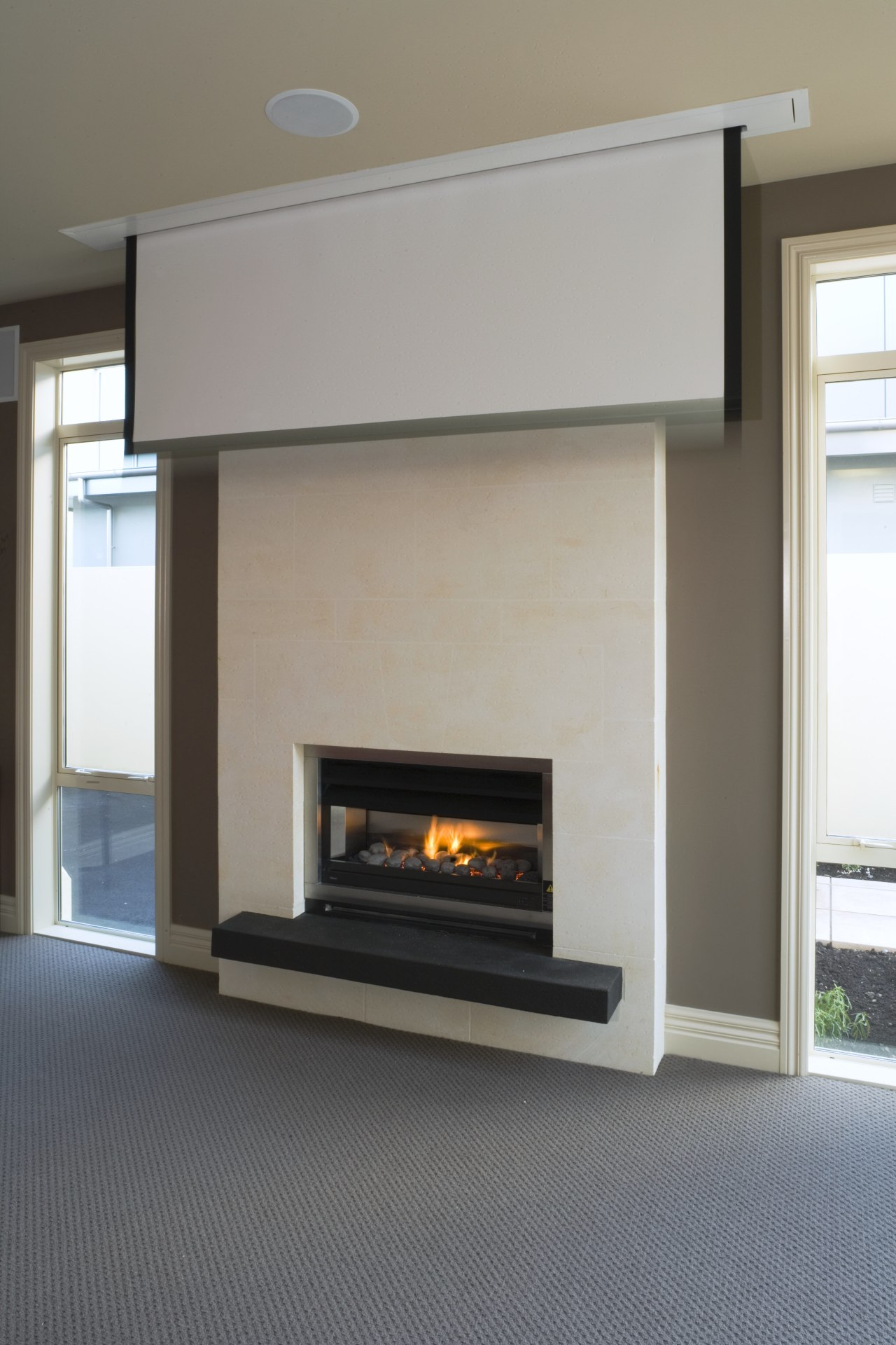 When not in use, this screen from Screentechnics fireplace, hearth, home appliance, gray