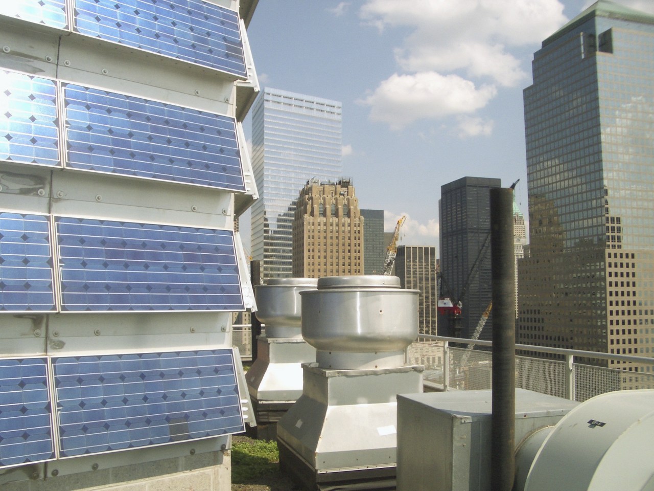 A view of the solaire in battery pack apartment, building, condominium, downtown, metropolitan area, real estate, roof, skyscraper, window, gray