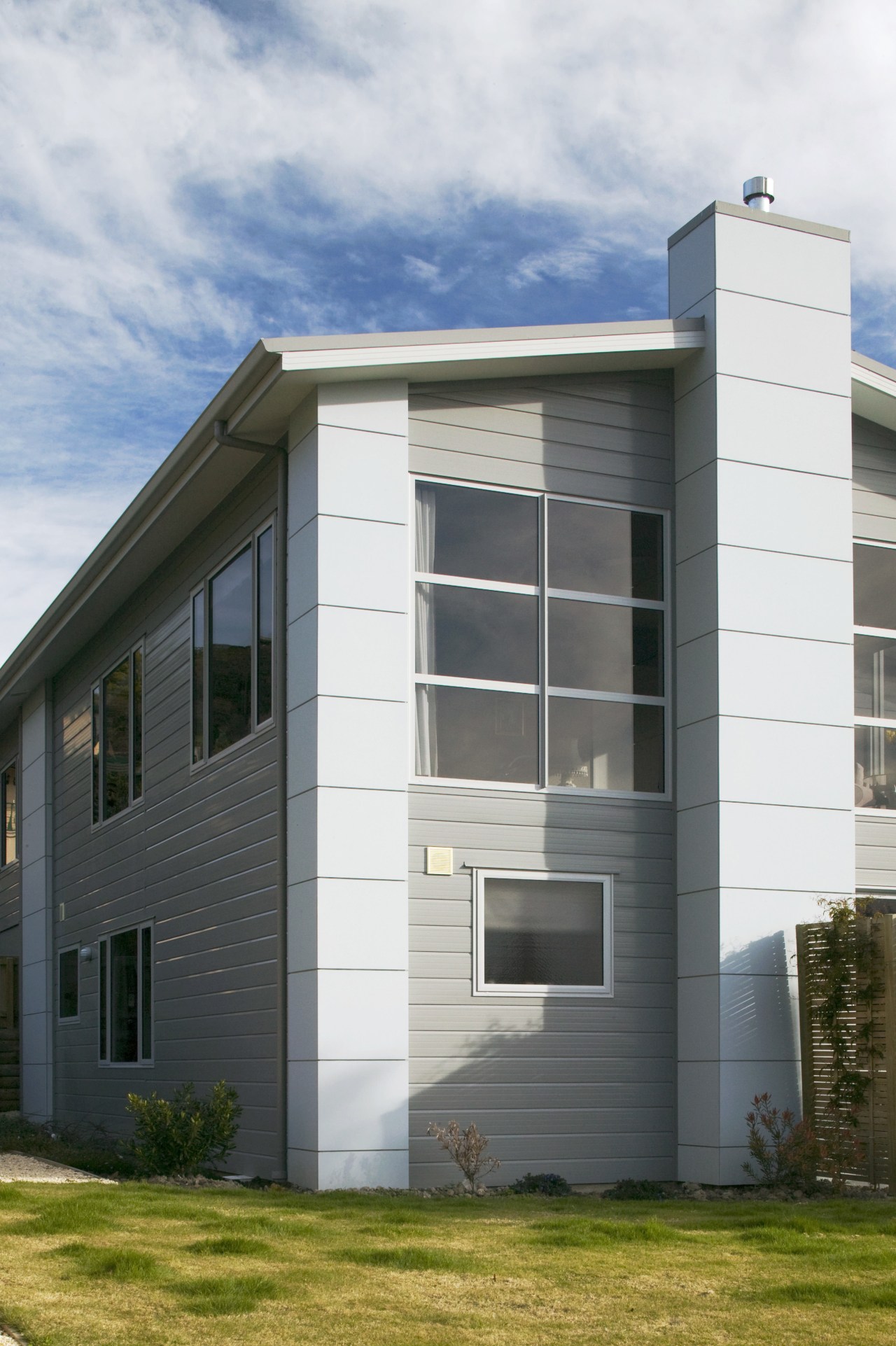 A view of some cladding from Ullrich Aluminium. architecture, building, commercial building, condominium, corporate headquarters, elevation, facade, home, house, property, real estate, residential area, siding, window, white