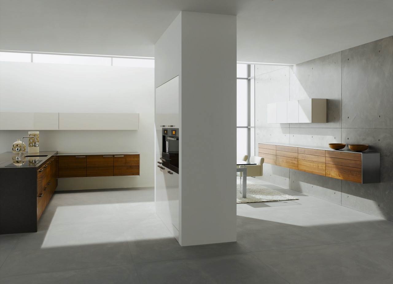 A view of this kitchen featuring Sleek contemporary architecture, countertop, floor, flooring, interior design, product design, tile, gray