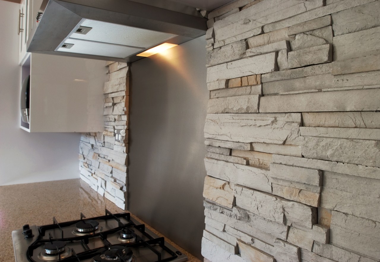 This splashback may look like it was chipped floor, wall, gray