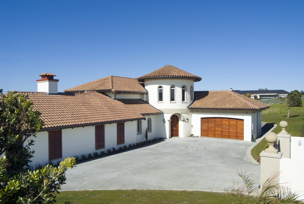 A view of some roofing from Natural Roofing building, cottage, elevation, estate, facade, home, house, mansion, property, real estate, residential area, roof, sky, suburb, villa