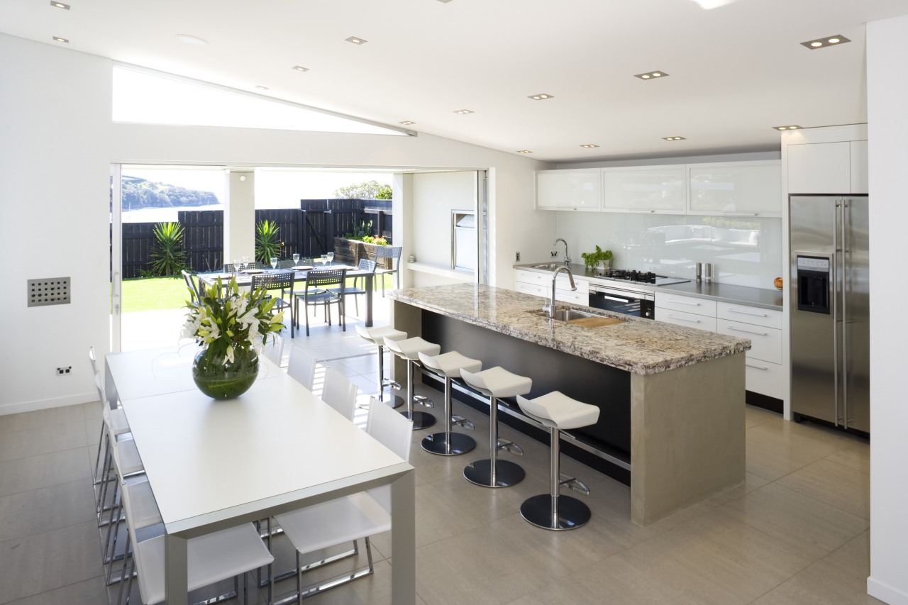 A view of the kitchen and dining areas, countertop, interior design, kitchen, real estate, white