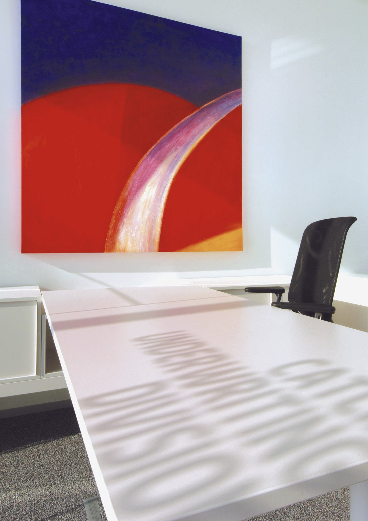 Interior view of Lloyd's Reinsurance Co. featuring stone floor, furniture, interior design, product design, table, wall, white