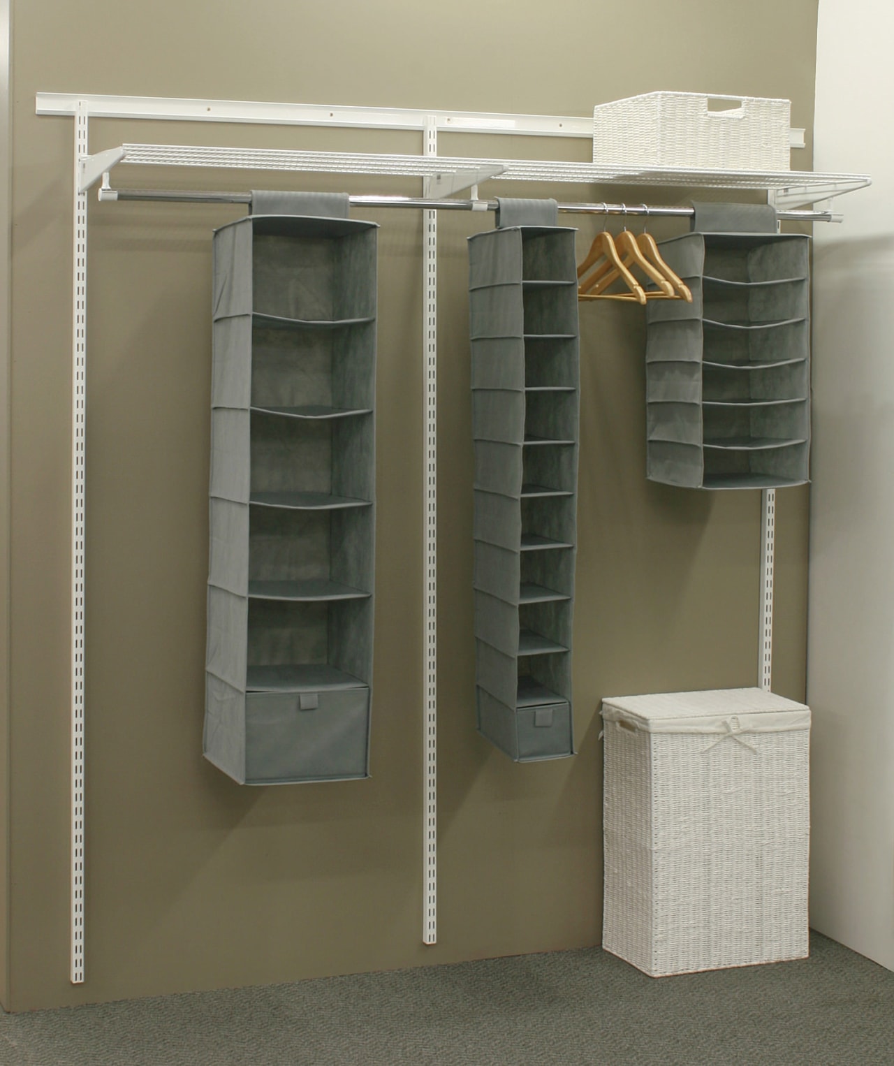 A view of these wardrobe storage shelves and closet, furniture, product, product design, shelf, shelving, gray, brown