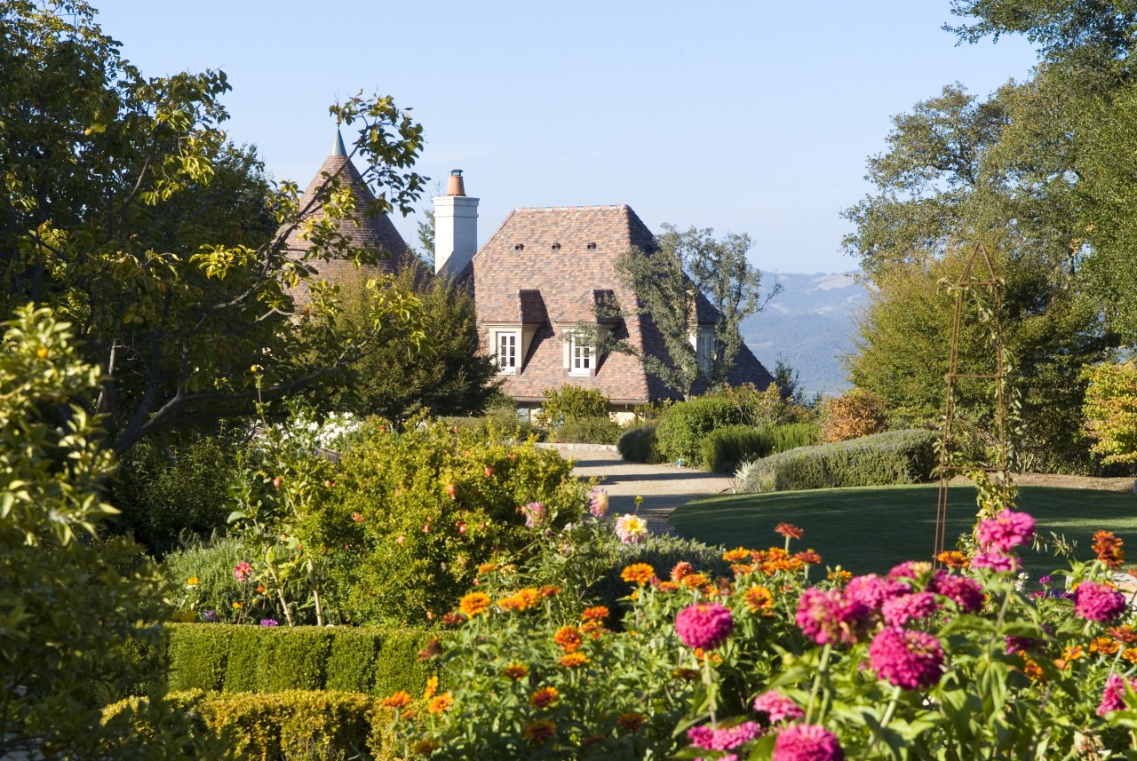 View of house from the garden. autumn, botanical garden, cottage, estate, flora, flower, garden, grass, home, house, landscape, landscaping, leaf, mansion, national trust for places of historic interest or natural beauty, nature, plant, real estate, shrub, sky, spring, tree, brown