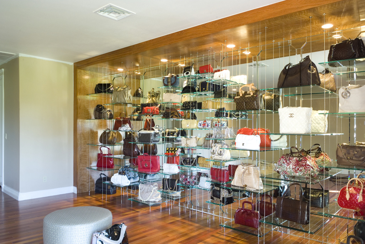 The handbag shelving unit is 25ft wide and display window, interior design, retail, brown